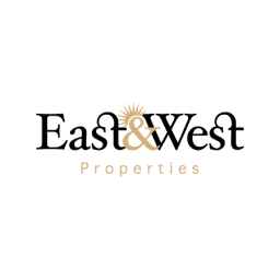 East and West Properties logo